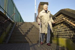 Person walking down steps, Barnes station